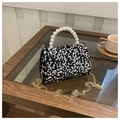 Detail of silver sequins on black evening bag with pearl handle and golden chain strap - Sequin Black
