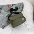 Olive green canvas messenger bag with adjustable strap and casual minimalist style - Green