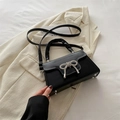 Elegant black glossy square handbag with a sparkling rhinestone bow and chain strap - Black