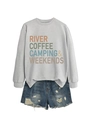 Close-up of gray 'River Coffee Camping' sweatshirt with distressed denim shorts - Gray