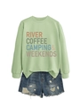 Sage green sweatshirt with River Coffee Camping slogan paired with blue ripped denim shorts - Olive Green