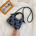 Quilted dark blue denim bucket bag with distressed frayed texture and black strap - Dark Blue