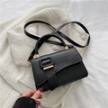 Minimalist black faux leather tote bag with gold metal buckle and adjustable strap - Black