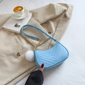Light blue quilted shoulder bag with white fluffy pom-pom and gold chain strap - Light Blue