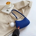 Royal blue chevron quilted corduroy shoulder bag with a fluffy white pom pom charm - Blue