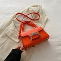 Fashionable bright orange leather handbag featuring a rhinestone bow and ruched handle - Orange