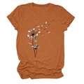 Detail of burnt orange t-shirt featuring creative dandelion book print and knit texture - Burnt Orange (Book Dandelion Print)