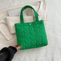 Green quilted tote bag with heart pattern and golden button closure for women - Green