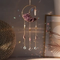 Detailed view of moon-shaped suncatcher with amethyst stones and colorful crystal prisms - Purple Cuckoo Half Moon Suncatcher