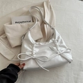 Elegant white satin tote bag featuring pleated details and twin bow accents with adjustable strap - White
