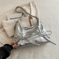 Silver metallic crossbody bag with dual bow accents and pleated texture finish - Silver