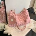 Pink bubble texture shoulder bag with flower charm and knotted strap detail - Pink