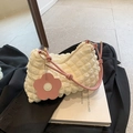 Creamy white popcorn texture shoulder bag with pink straps and flower charm detail - White and Pink