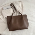 Minimalist large brown leather tote bag with vertical stitching and long shoulder straps - Brown