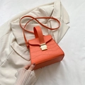 Orange croc-embossed trapezoid handbag with gold buckle and adjustable strap - Orange