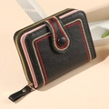 Women's short bifold wallet in black litchi leather with red embroidery and gold zipper - Black