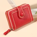Short red lychee leather wallet for women with gold stitching and zipper closure - Red
