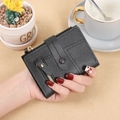 Short black women's wallet in pebbled faux leather with gold zipper and snap closure - Black