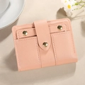 Pink minimalist bifold wallet with multi-card slots and golden hardware details - Pink