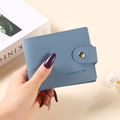 Short grey-blue lychee grain leather wallet with gold buckle and embossed brand logo - Blue