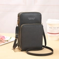 Classic black crossbody phone bag in pebble grain leather with three zip pockets - Black