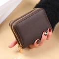 Dark brown double zipper card wallet with lychee leather texture and golden metal hardware - Coffee