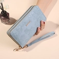 Light blue double zipper long wallet featuring floral embossing and wrist strap - Blue