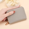 Porte-cartes en cuir gris texturé avec fermeture éclair dorée et design accordéon - Gris