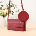Dark red crossbody phone bag in pebble leather with a matching mini round coin purse - Red