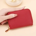 Compact red pebbled leather zip wallet with gold hardware and multiple card slots - Red