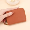 Brown textured leather card holder with gold zipper closure and compact design - Brown