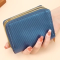 Deep blue accordion card holder with double zippers and carbon fiber texture for women - Blue