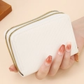 Cream white accordion card holder with dual gold zippers and crosshatch texture - White