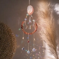Boho crystal suncatcher with moon frame, agate slice, and butterfly pendant hanging - Rabbit Agate Red Stone Suncatcher