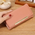 Coral pink long wallet for women with golden logo bar and multi-slot bifold design - Pink