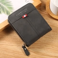 Short dark grey men's bifold wallet with matte texture and zippered coin pocket - Black