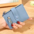 Light blue lychee texture leather mini wallet with gold zipper and button closure - Blue