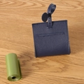 Navy blue faux leather pet waste bag dispenser with hook for leash attachment - Blue