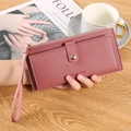 Portafoglio lungo da donna in ecopelle rosa con cerniera e pratico cinturino da polso - Rosa Intenso
