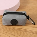 Gray canvas pet waste bag dispenser with durable carabiner clip and rubber dispenser hole - Gray