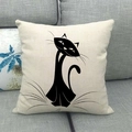 Close-up of minimalist black cat silhouette on textured beige linen pillow cover - Minimalist Art Cat Silhouette Style (16)