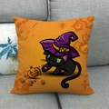 Detail of Halloween throw pillow cover with a black cat, wizard hat and pumpkin design - 45x45cm / Orange Black Cat Wizard Style (5)
