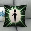 Linen pillow cover featuring a black alien silhouette on a green radial light background - Alien Beam Silhouette Style (7)