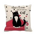 Linen cushion cover featuring a hand-drawn black tuxedo cat on a red sofa illustration - Cow Cat Illustration Happy Quote Style