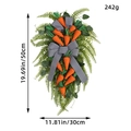 50cm Easter carrot swag with artificial greenery and black striped bow decoration - Carrot Teardrop Swag