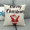 Detail van linnen kussensloop met kerstmanprint en Merry Christmas tekst op de hoes - Kerstman Stijl (4)