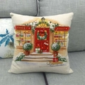 Close-up of beige linen Christmas pillow cover featuring a Sweet Shop holiday illustration - Winter Sweet Shop Scene (11)