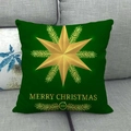 Détail de la housse de coussin en lin vert avec étoile hexagonale dorée et motif de Noël - Étoile de Noël Vert Foncé (2)
