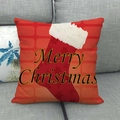 Weihnachtskissenbezug mit roten Socken und Merry Christmas Text auf einem grauen Sofa - Rote Ziegelwand Weihnachtssocke (3)