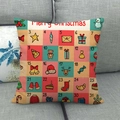 Detailaufnahme des Weihnachts-Adventskalender-Kissenbezugs mit bunten Motiven - Bunter Adventskalender Gitter (4)